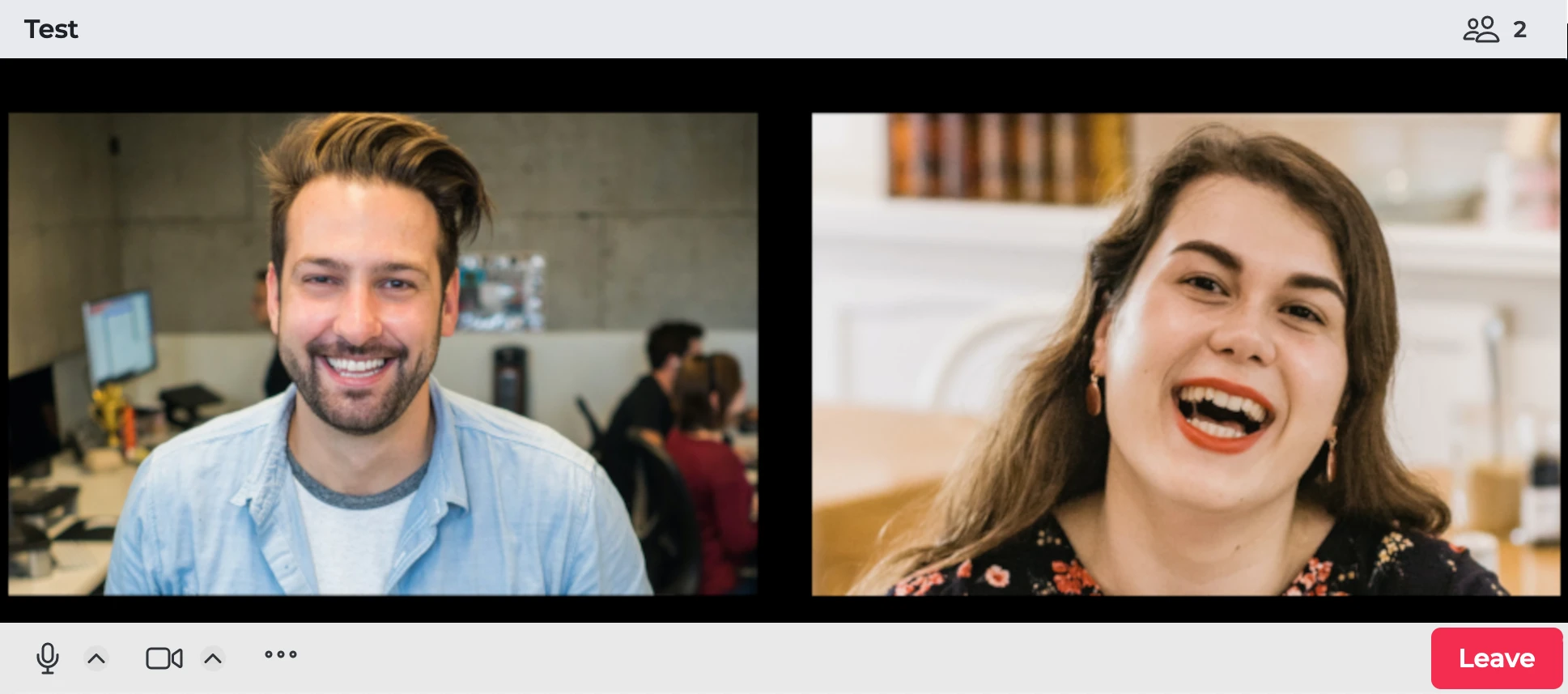 A screenshot of a working video room with two participants. Menu buttons at the bottom enable muting and unmuting audio and video. A red button in the bottom right is labeled 'Leave'.