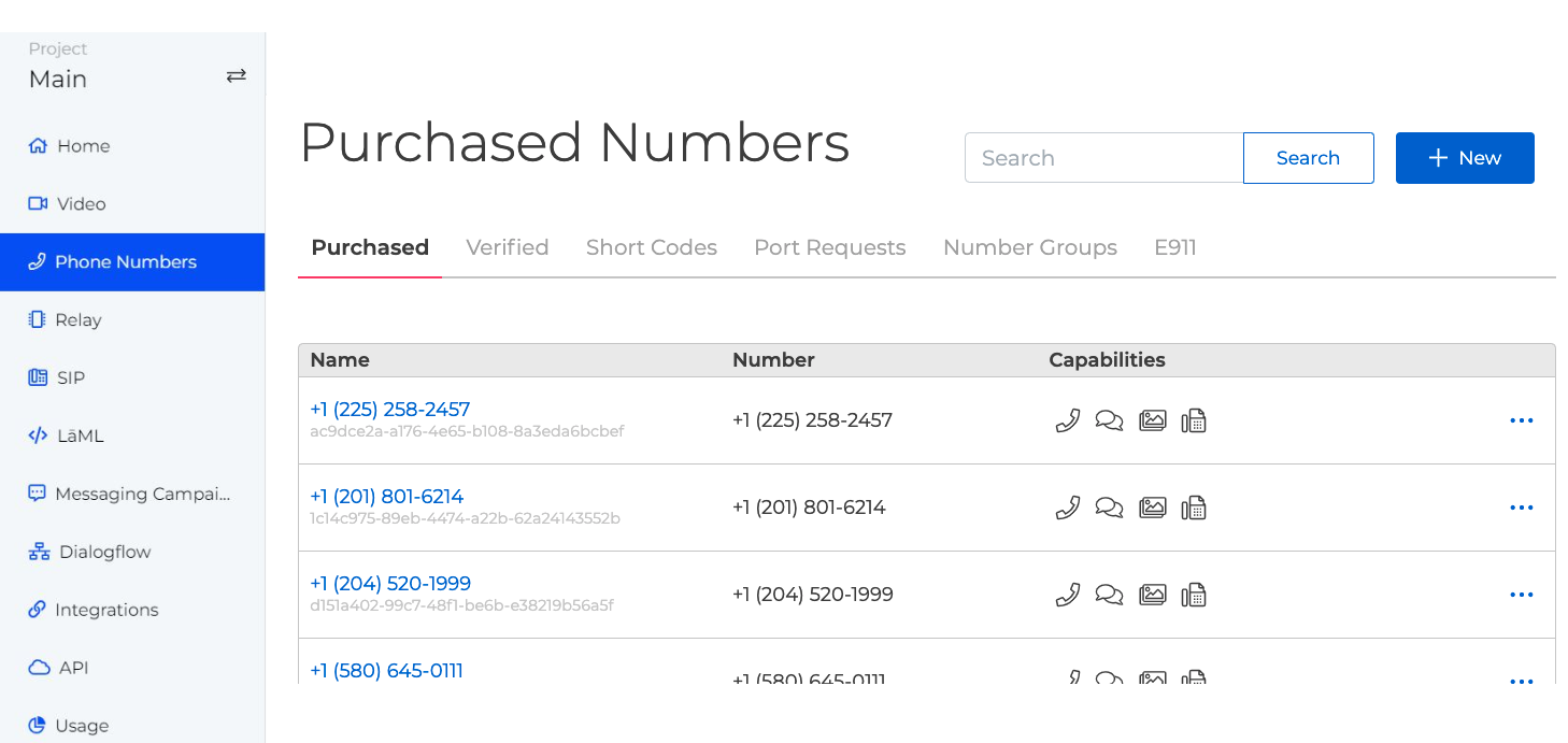 A screenshot of the Phone Number page with the Purchased tab selected. A blue button enables purchasing new numbers. Other tabs allow viewing verified numbers, short codes, number groups, E911 numbers, and submitting porting requests.
