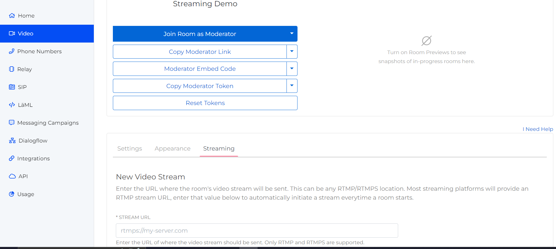 A screenshot of the Streaming tab of a given Video Conference on the Video page of a SignalWire Space. The Streaming tab includes a field labeled Stream URL, where  the room's video stream will be sent.